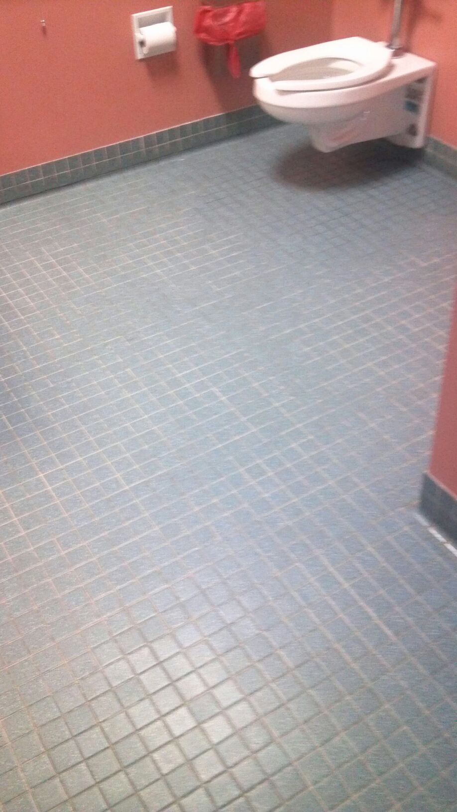 Commercial Bathroom Tile & Grout Before and After Photo
